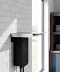 Rock Solid Stainless Steel EV Charger Protective Cover For Outdoor Charging Stations mounted on a wall with a sleek silver shelf.