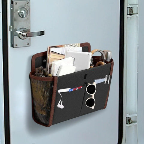 Heavy Duty RV Wall Organizer With Adhesive Pockets on camper door, holding travel essentials, large capacity storage solution