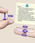 Assorted Color Round Head Craft Brads 200 Pack Top Tier Plated Metal Fasteners For Scrapbooking, purple brad shown on finger for size context.
