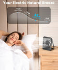 Woman sleeping with USB Desk Fan With Dope 7 Blade Design High Airflow Yet Ultra Quiet Personal Cooler on nightstand.
