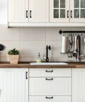 Matte Black Kitchen Cabinet Handles Set Of 10, 4-3/4 Inch Length, 3-3/4 Inch Hole Centers, installed on white cabinets