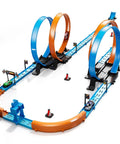 Epic Kids Race Track Gift Set With 35 Plus Pieces Four High Speed Die Cast Cars Four Action Loops And Endless Configurations For Boys Aged 3 To 12 Ideal For Solo Play Or Family Race Nights featuring two loop tracks and cars.