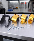 Tough As Nails Aluminum Alloy Engine Mount Bracket With Precision Cut Bolt On Hardware For Rock Solid Stability And Zero Engine Shake Grease Monkey Approved For Weekend Builds displayed on a workbench with mounting hardware.