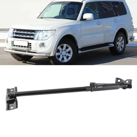 Heavy Duty Tailgate Support Strut For Mitsubishi Pajero Replaces OEM 5822A001 near vehicle, showcasing robust metal alloy design.