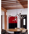 Post-Modern Nordic Pendant Light Herringbone Contemporary Living Room Dining Room Dimmable G9 Bulb Hanging Lamps LED in a modern dining space.