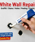 Hand using Wall Repair Paste Kit For Drywall Cracks And Nail Holes, Quick And Easy Spackle Cream on holes in a white wall