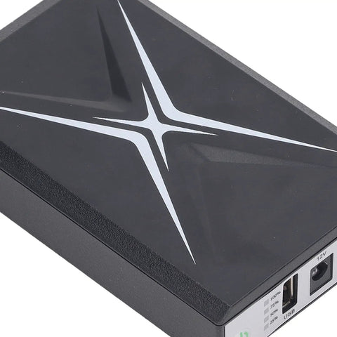 Portable Mini Ups Battery Backup 10400Mah shown from above, sleek black design, ideal for keeping routers and cameras powered.