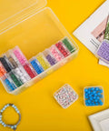 Clear Bead And Small Parts Storage Organizer Case With 30 Mini Compartments, Hinged Lid, Open, Filled with Assorted Colorful Beads