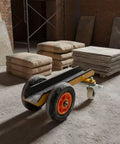 Rock Solid Heavy Duty Slab Mover Cart And Panel Transport Trolley with channel steel chassis and durable rubber wheels in workshop setting.