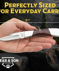Compact 2.25 Inch Folding Pocket Knife With 440 Stainless Clip Point Blade Rosewood Handle And Nickel Silver Bolsters shown in hand