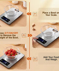 Digital Kitchen Scale With Lab Grade Precision, 11 lb capacity, showing tare function with bowl and strawberries.