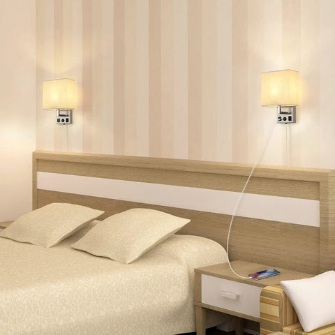 Slick Dual USB Wall Sconces Set beside bed with USB ports and outlets, modern wall lamp for bedroom, E26 base LED bulbs included.