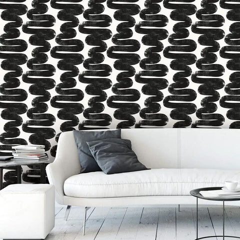 Mid-century modern room with Removable Peel And Stick Black And White Wiggle Room Wallpaper For Easy Mess Free Self Adhesive Wall Covering No Residue Left Behind DIY Friendly Mid Century Modern Vibe Made In The USA 20.5-Inch By 16.5-Foot behind a white sofa.