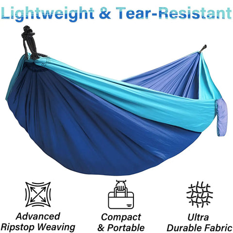 Blue Outdoor Camping Hammock Portable with tree straps and rope, 56 by 103 inches, durable nylon suspension in blue tones