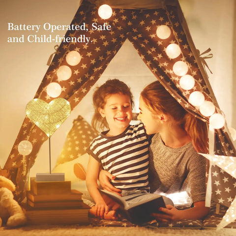 Mother and daughter under canopy with Heart Shaped Led Desk Lamp With Cotton Thread Glow, Battery Powered Night Light For Bedroom