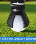 End Of Putter Golf Ball Picker With Triple Claw Grip For All Putters shown picking up a golf ball on grass