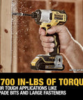 Hand using 20V Max Cordless Brushless Impact Driver One Quarter Inch Chuck Tool Only For Pros And DIYers Compact Ergonomic Grip 1700 In-Lbs Torque 3200 RPM Variable Speed Trigger For Precise Control And Fast Screw Driving against wood surface