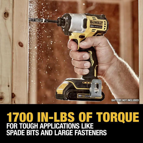Hand using 20V Max Cordless Brushless Impact Driver One Quarter Inch Chuck Tool Only For Pros And DIYers Compact Ergonomic Grip 1700 In-Lbs Torque 3200 RPM Variable Speed Trigger For Precise Control And Fast Screw Driving against wood surface