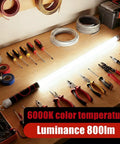 30 Inch Bendable LED Flashlight Stick With Rechargeable Battery High Lumen Mechanic Light 6000K on a workbench with tools