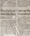 Close-up of handheld magnifier from 24 Pack Handheld Magnifiers With 5X And 15X Lenses over newspaper text.