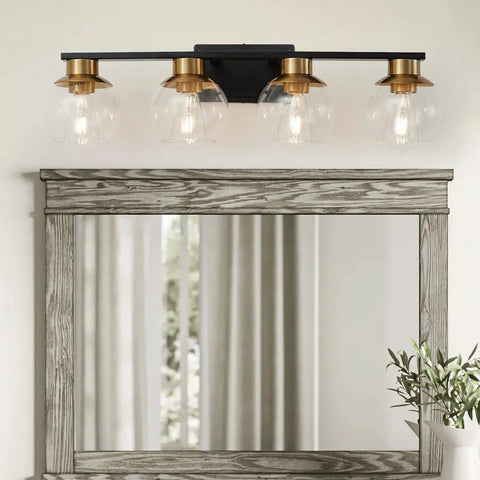 Black Gold 4 Light Vanity Light Fixture Over Mirror With Globe Glass Shades E26 Base Mid Century Modern Wall Sconce in bathroom.