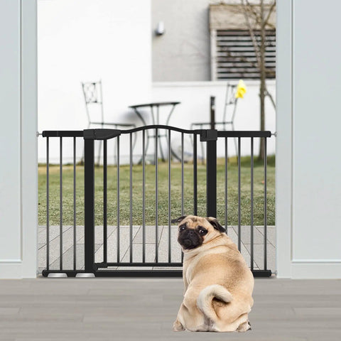 Extra Wide Baby Gate With Door For Doorways And Stairs Walk Through Swing Gate Pressure Mounted Tool Free Setup in a doorway with a dog