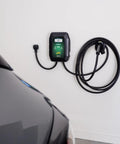 Level 2 Wall Mounted EV Charger With 40 Amp Fast Charging And 25 Foot Flexible Cable NEMA 14 50 Plug installed on a garage wall.
