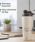 Dual Insulated Stainless Steel Protein Shaker Bottle With Separate Dry Storage Compartment And Built In Mixing Whisk 15 Oz Gym Cup on desk