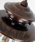 Close-up of No Fuss Dusk To Dawn Sensor Outdoor Wall Sconce with Photocell, oil rubbed brown finish, showing top detail.