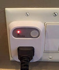 Auto Shut Off Safety Outlet With 30 Minute Timer For Curling Irons And Flat Irons, plugged into wall showing timer.