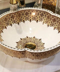 USZWBY Bathroom Sink, Countertop Basin Ceramic Sink with gold floral design and round shape for elegant bathroom decor.