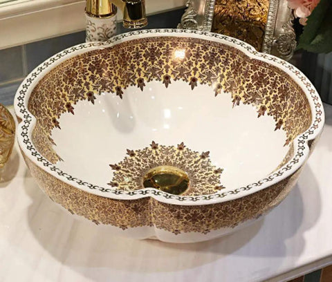 USZWBY Bathroom Sink, Countertop Basin Ceramic Sink with gold floral design and round shape for elegant bathroom decor.