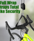 Ceiling Mount Bike Hoist With 100 Lb Capacity Overhead Storage For All Bike Types From E Bikes To Fat Tires Ideal Garage Or Workshop Space Saver Lift Your Ride Off The Floor And Free Up Cubic Footage showing secure bike hoisting straps in use