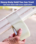 Person using Workhorse Filament Tape 2 Inch By 30 Yards Reinforced Packing Tape With Strong Adhesive on PVC pipes.