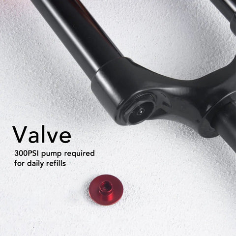 Close-up of Mountain Bike Front Suspension Fork 27.5 Inch Air Suspension Magnesium Alloy Damping System Valve with Red Cap
