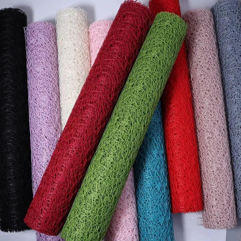 Colorful rolls of Pro Grade Flower Wrapping Mesh Paper For Bouquets, Irregular Hollow Net Wrapper, 50Cm Wide Roll, 4.5M Long displayed.