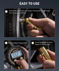 AstroAI tire pressure gauge with backlit LED, brass body and rubber hose; installed on tire valve with digital display.
