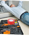 Man using Heavy Duty Outdoor Seam Tape For Plumbing Leaks And Weatherproofing Sealant Duct Tape Repair Tape Leak Stop Tape in kitchen
