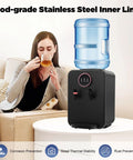 Woman drinking tea near Top Loading 4.99 Gallon Hot And Cold Water Dispenser With Electric Cooler And Heater Auto Temp Control Black Finish.