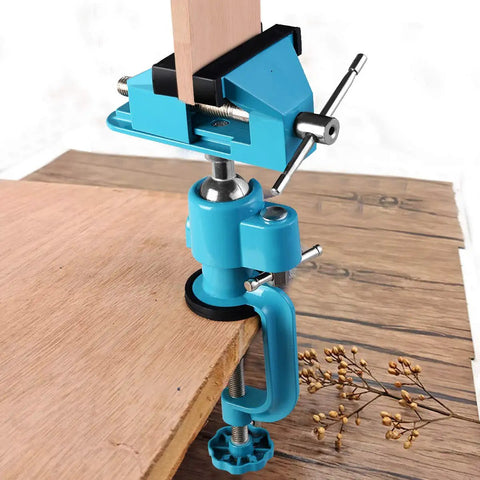 Heavy Duty Aluminum 3 Inch Tabletop Swivel Bench Vise Tilts And Rotates 360 Degrees clamping wood securely on table