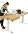 Sleek Tile Adjustable Height Sewing Table, 47 Inch Maple Workbench With Smart Memory Presets, Ergonomic Craft Desk for sewing projects.
