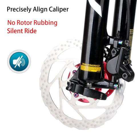 Image showing a close-up of a bike disc brake, highlighting the 4 Pack Bike Disc Brake Pad Replacement Kit With Rotor Alignment Tool and 304 Stainless Steel Spacer Fits All MTB Road BMX Bikes For Easy Gap Regulation And Precise Braking Must Have.