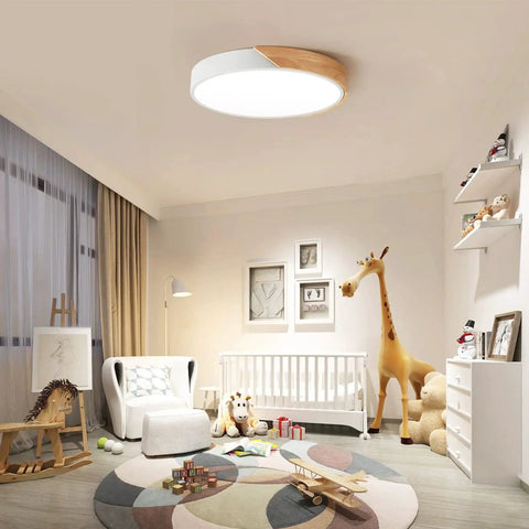 Modern LED Ceiling Light With Wood Flush Mount Design in a children's room setting, showcasing neutral white illumination.