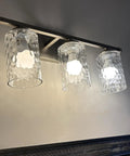 Three Pack Clear Hammered Glass Lamp Shade Replacement 1-5/8 Inch Fitter, 6-1/16 Inch Tall on wall sconce with E26 bulb