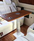 Automatic Electric Table Lift For RV Dinette With Folding Legs And Wireless Remote Control Smooth Height Adjustment Up To Eighty Eight Pounds in a stylish RV interior.