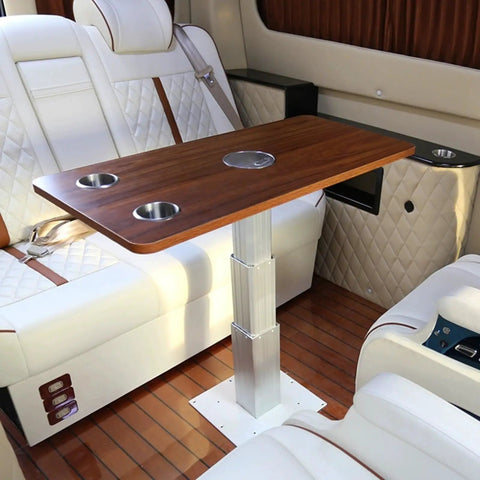 Automatic Electric Table Lift For RV Dinette With Folding Legs And Wireless Remote Control Smooth Height Adjustment Up To Eighty Eight Pounds in a stylish RV interior.