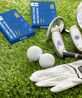 Golf Impact Tape With Red Target Sweet Spot For Instant Swing Feedback And Self Teaching Practice Indoor And Outdoor Use 300 Count High Precision Swing Training Aid with golf clubs and balls on grass.