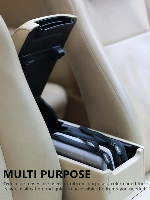 Hard Shell Tech Travel Case With All In One Cable Organizer And Mesh Pockets To Keep Your Adapters Power Banks External Drives And Memory Cards Locked Down And Ready For Any Daily Hustle Or Weekend Cruise Black in a car's center console.