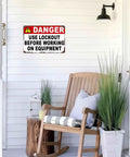 Danger Use Lockout Before Working On Equipment Metal Sign 8x12 Inch Aluminum Wall Decor on white wall with chair and plants