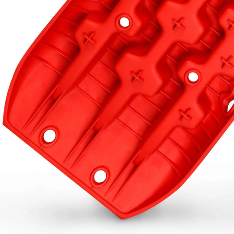Close-up of red Recovery Traction Tracks for 4WD SUVs and Trucks, Mud Sand Snow Off Road Mats, Ladder Style Tire Ladder Kit